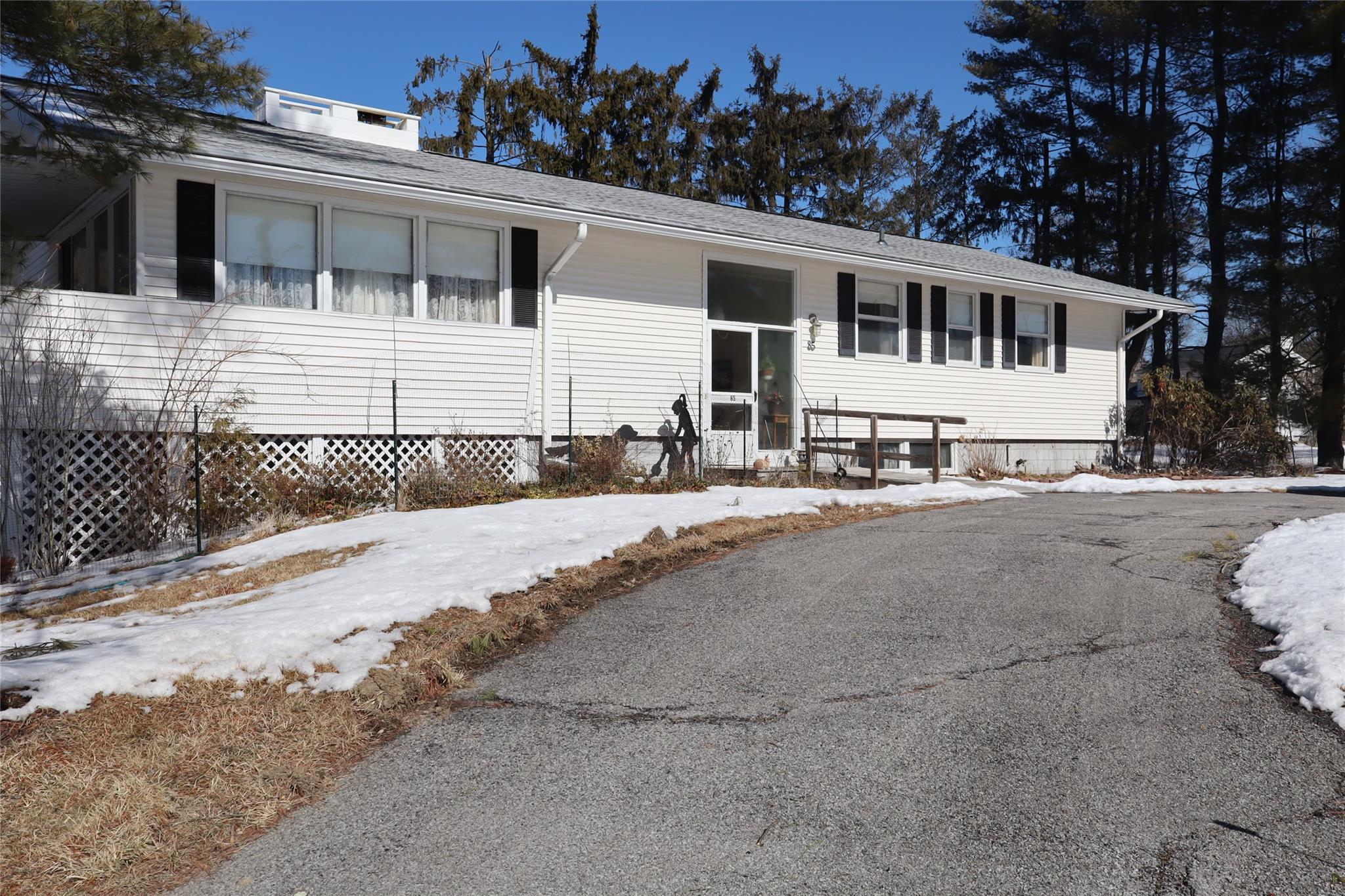 a front view of a house with a outdoor space