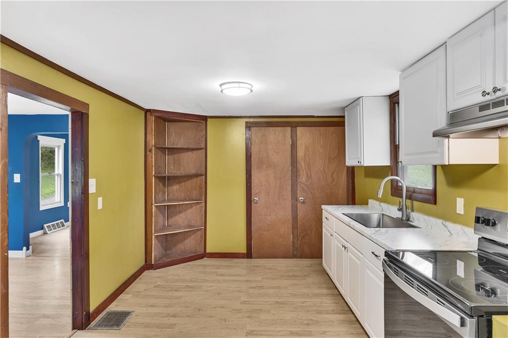 514 Kings Road Apollo, PA 15613 - Photo 12 of 33 a view of a kitchen with fridge and a sink
