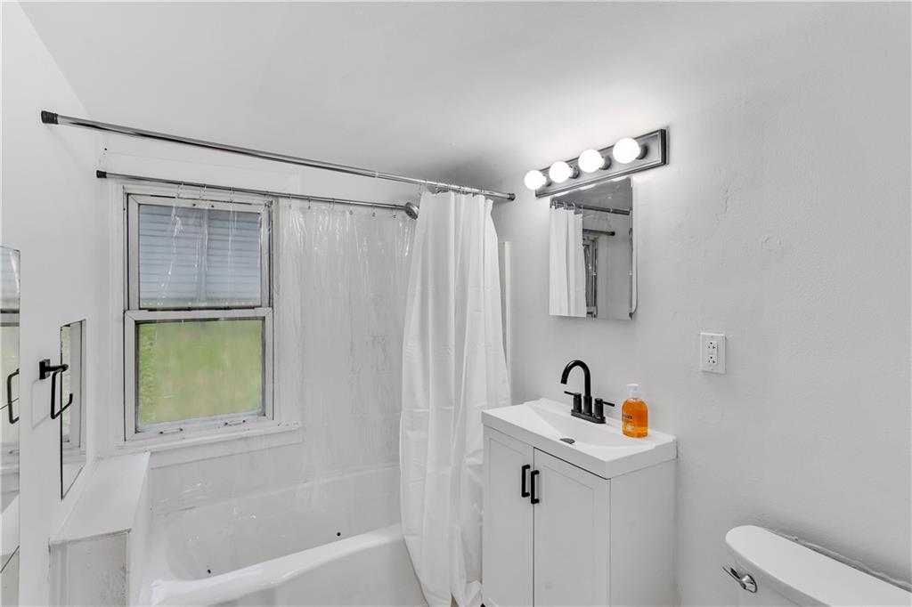 514 Kings Road Apollo, PA 15613 - Photo 16 of 33 a bathroom with a sink a toilet and shower