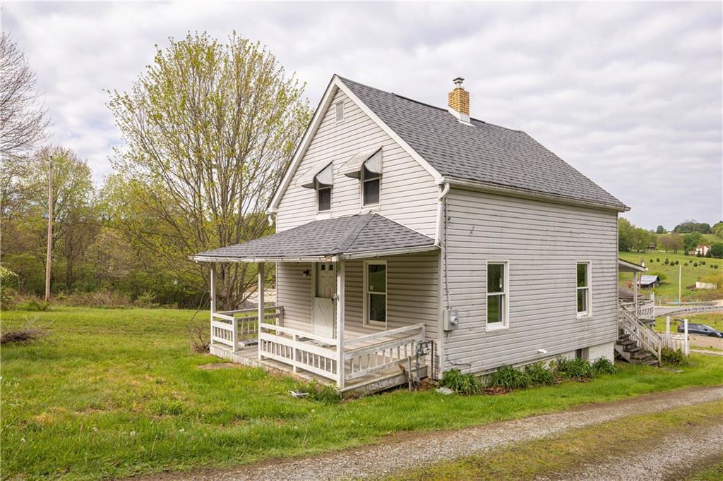 514 Kings Road Apollo, PA 15613 - Photo 2 of 33 a front view of a house with a yard