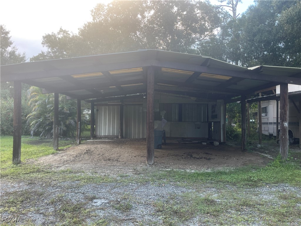 11631 Deal Road North Fort Myers, FL 33917 - Photo 26 of 30 a view of a house with backyard