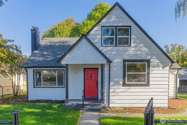 a front view of a house with garden
