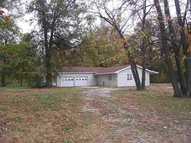 286 Rr 2 Clinton, IL 61727 - Photo 2 of 2 a house with trees in front of it