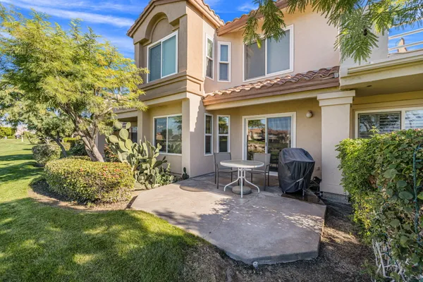 a view of a house with a patio