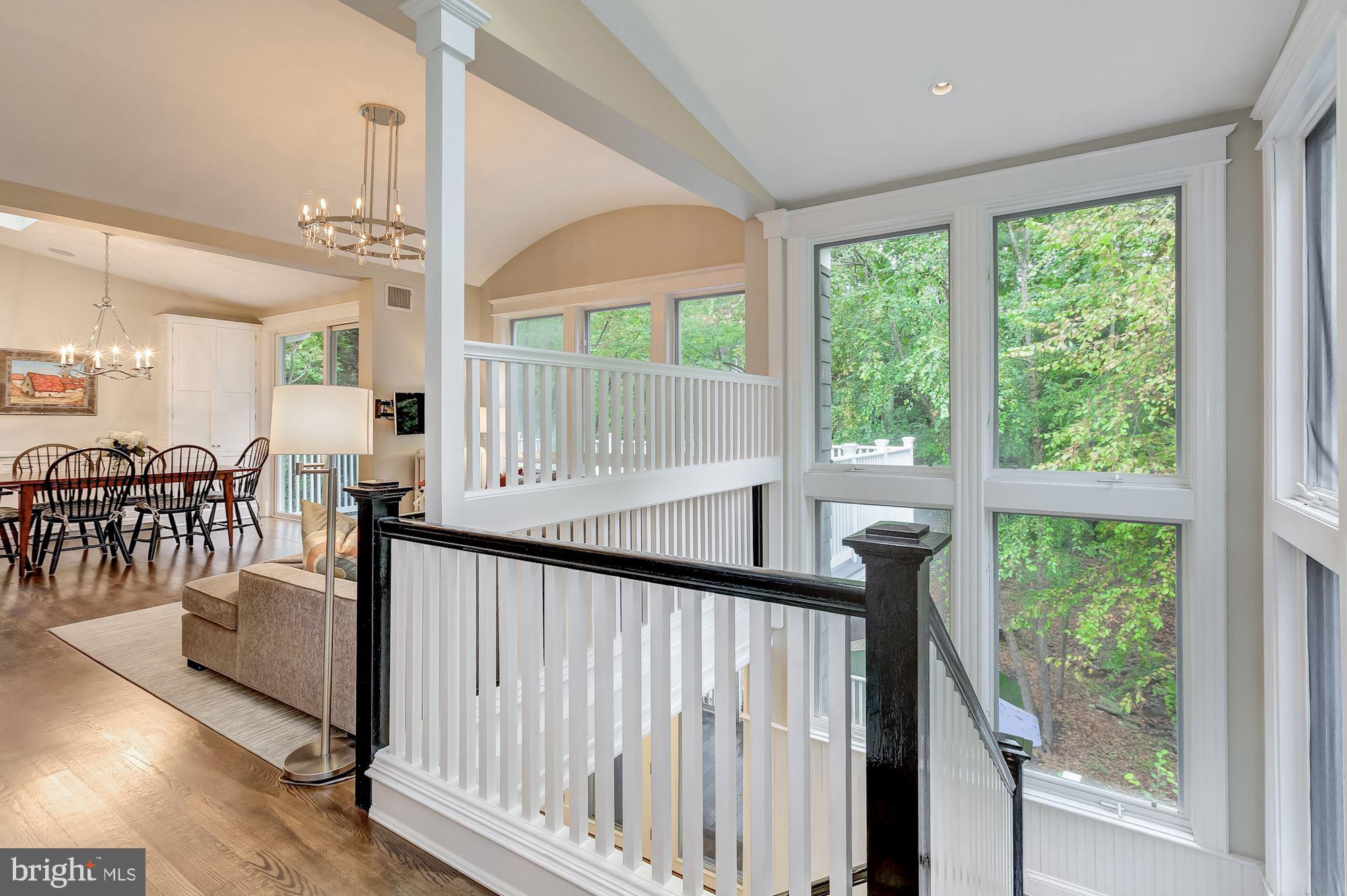 3307 Macomb Street Northwest Washington, DC 20008 - Photo 34 of 47 Walls of Windows Heading to the Lower Level