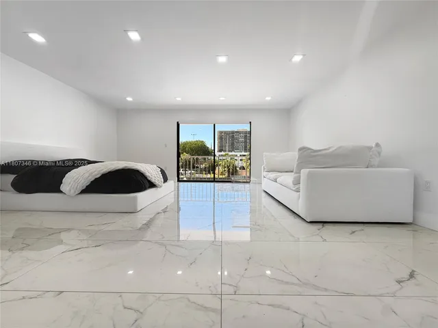 a living room with furniture and glass floor