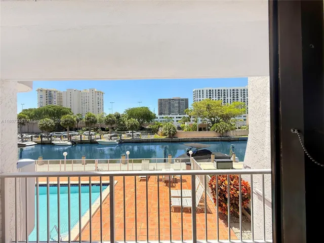 a view of a lake from a balcony