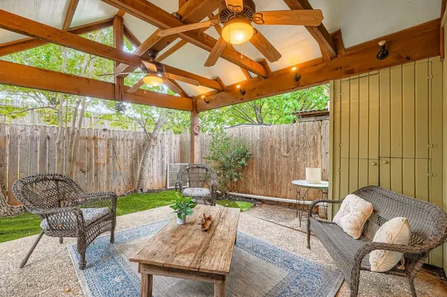 a backyard of a house with seating space
