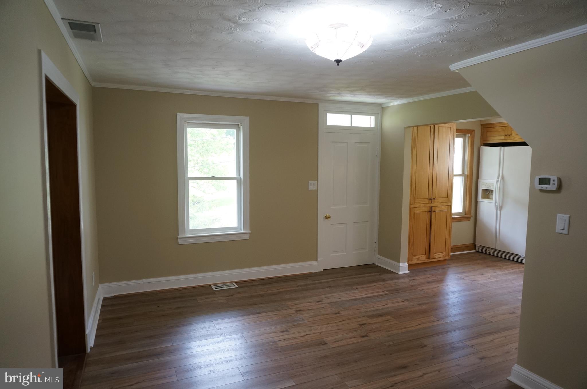 6425 Zittlestown Road Boonsboro, MD 21713 - Photo 4 of 57 Adjoining Dining Area Showing Front Door