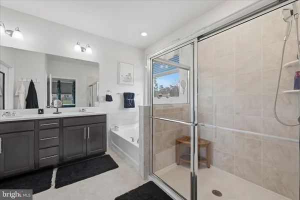 a view of entryway livingroom and hall with wooden floor
