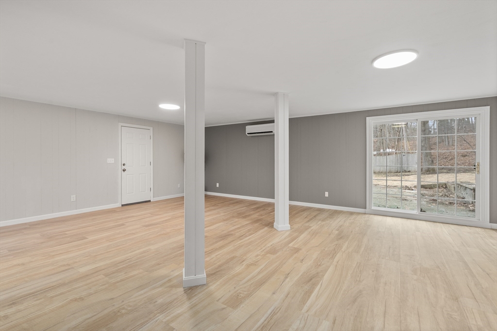 3 Mower Street Paxton, MA 01612 - Photo 17 of 36 a view of an empty room with wooden floor and a window