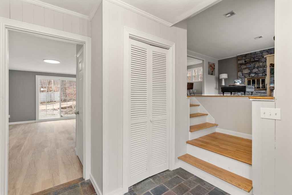 3 Mower Street Paxton, MA 01612 - Photo 19 of 36 a view of a hallway with wooden floor and windows