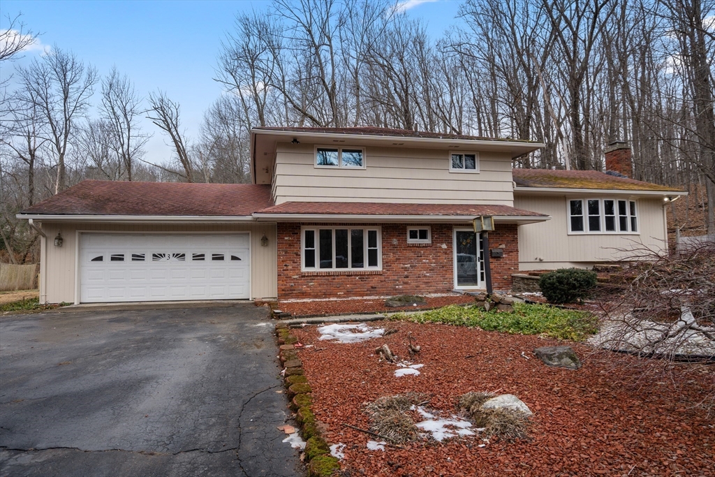 3 Mower Street Paxton, MA 01612 - Photo 2 of 36 a front view of a house with a yard