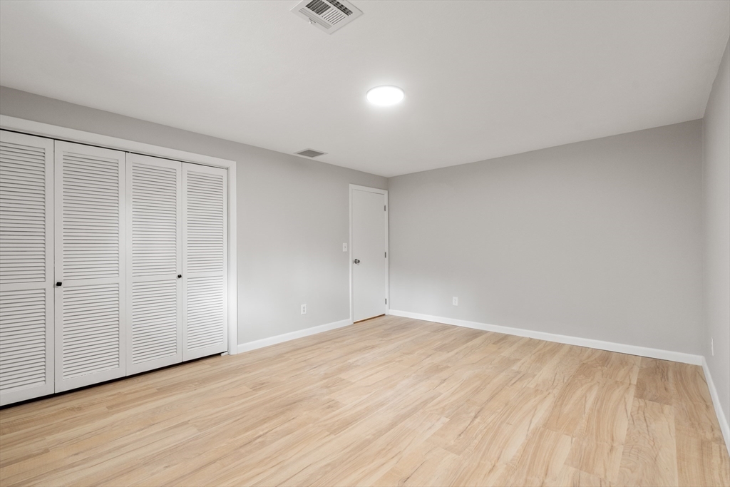 3 Mower Street Paxton, MA 01612 - Photo 26 of 36 a view of an empty room with wooden floor and a window