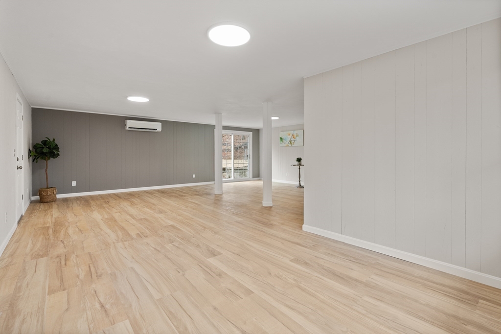 3 Mower Street Paxton, MA 01612 - Photo 30 of 36 an empty room with wooden floor and windows