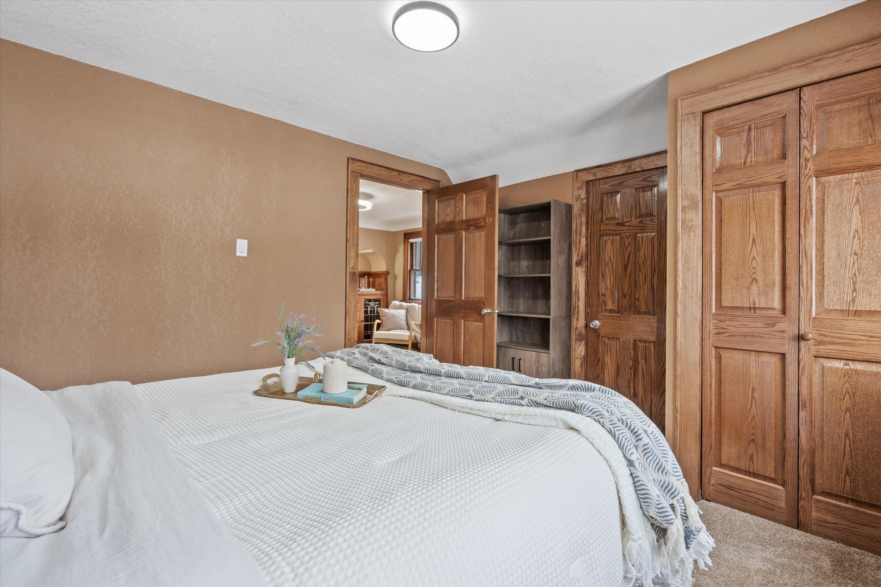 5352 North 39th Street, Unit 5352A Milwaukee, WI 53209 - Photo 23 of 42 Two Closets and Bookshelf