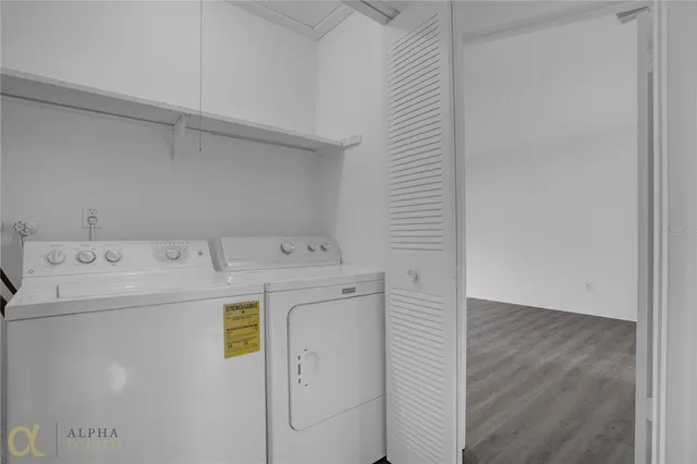 a utility room with dryer and washer