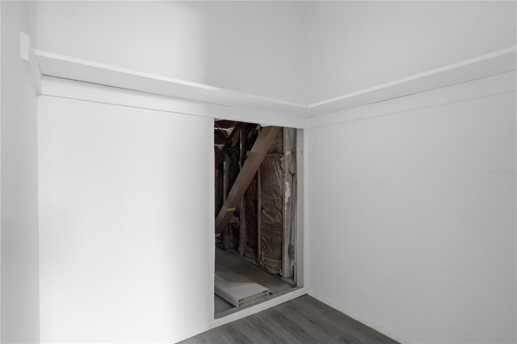 4025 Billingsgate Road, Unit 2004 Orlando, FL 32839 - Photo 18 of 23 a view of walk in closet with clothes