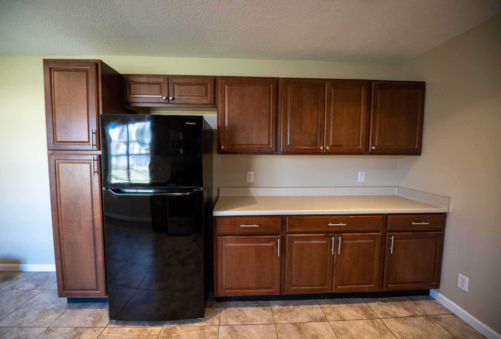 2304 Cedar Bayou Road Baytown, TX 77520 - Photo 6 of 14 a kitchen with stainless steel appliances granite countertop a refrigerator and a cabinets