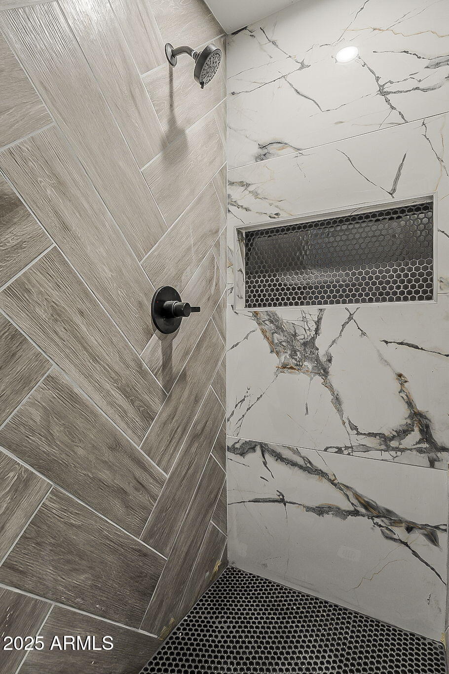 8644 West Mountain View Road Peoria, AZ 85345 - Photo 27 of 35 a bathroom with a shower