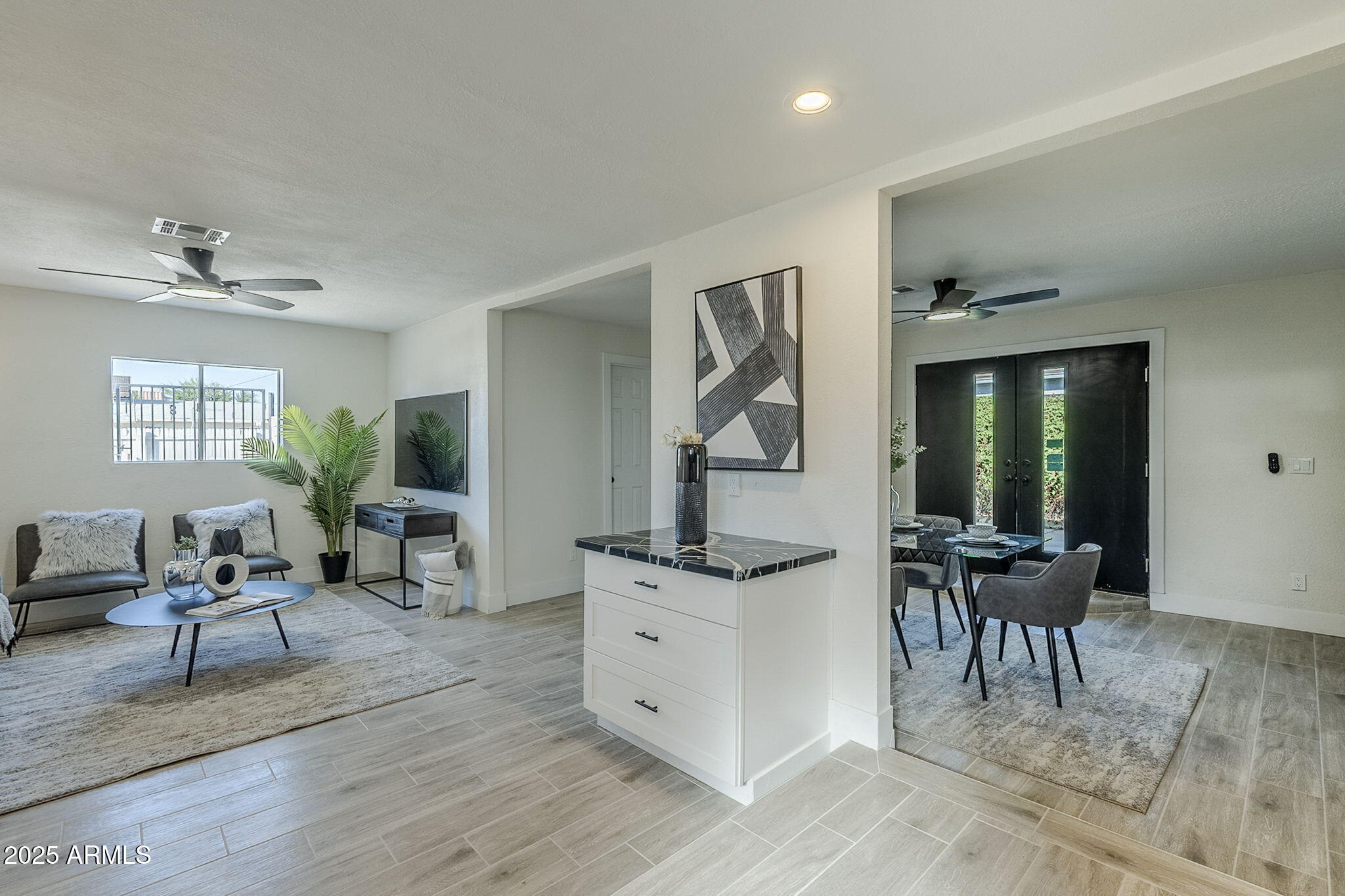 8644 West Mountain View Road Peoria, AZ 85345 - Photo 9 of 35 a living room with furniture and wooden floor