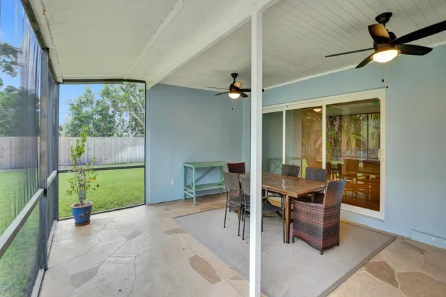 a workspace with furniture and a window