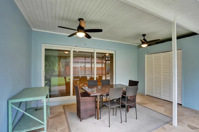 a view of a bathroom from a hallway