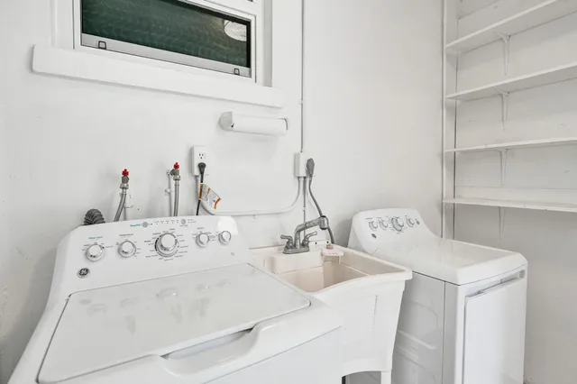 a utility room with dryer and washer