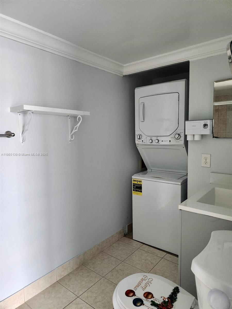 11790 Southwest 18th Street, Unit 2183 Miami, FL 33175 - Photo 22 of 28 a utility room with dryer and washer