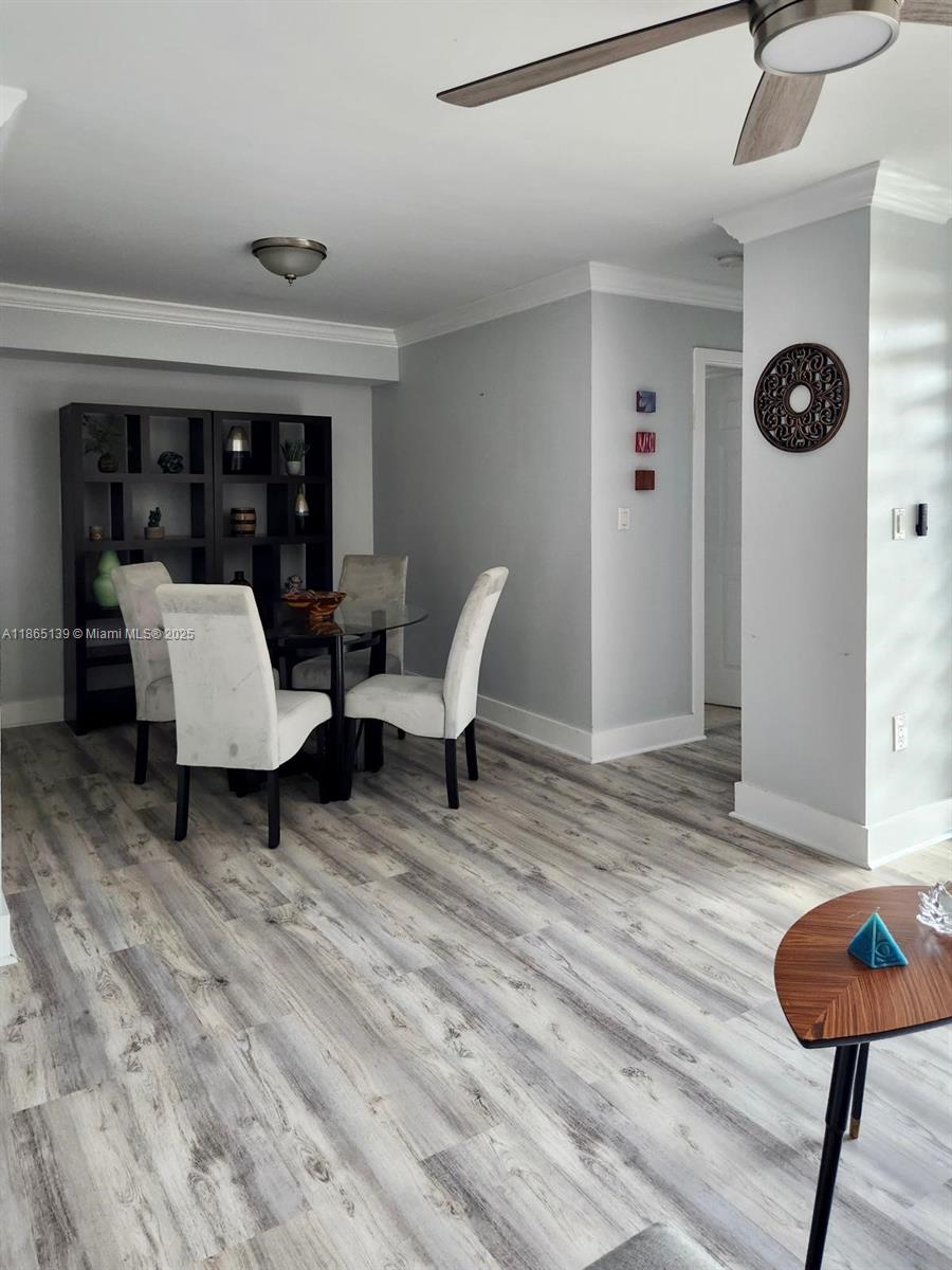 11790 Southwest 18th Street, Unit 2183 Miami, FL 33175 - Photo 9 of 28 a living room with furniture and a large window