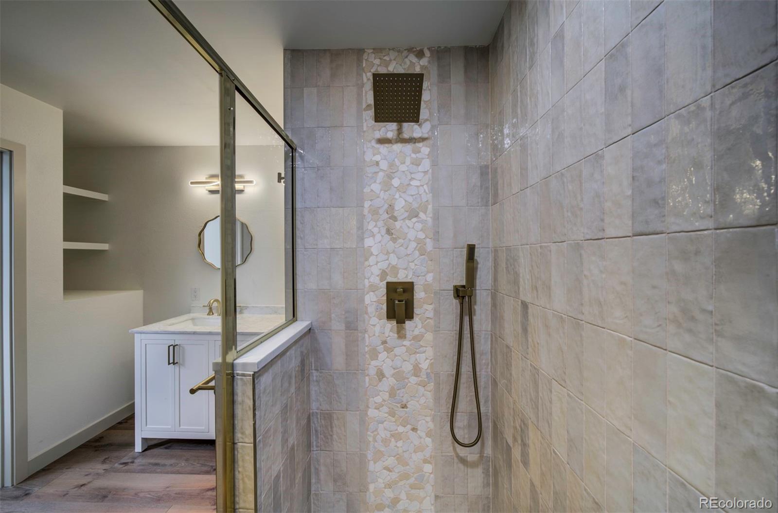 1815 South Monroe Street Denver, CO 80210 - Photo 22 of 37 a bathroom with a shower