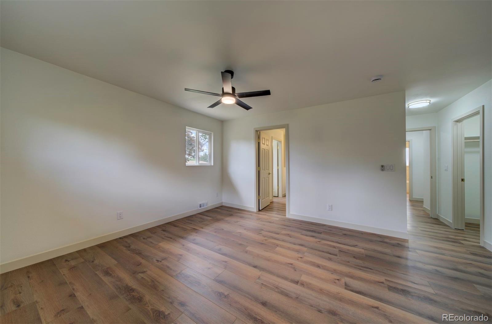 1815 South Monroe Street Denver, CO 80210 - Photo 26 of 37 a view of an empty room with a window