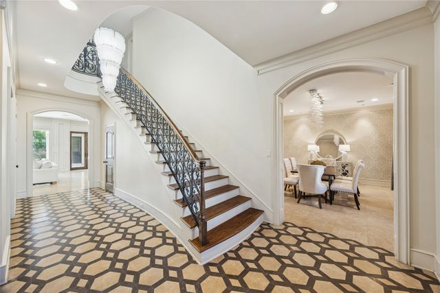 a view of a hallway view with staircase