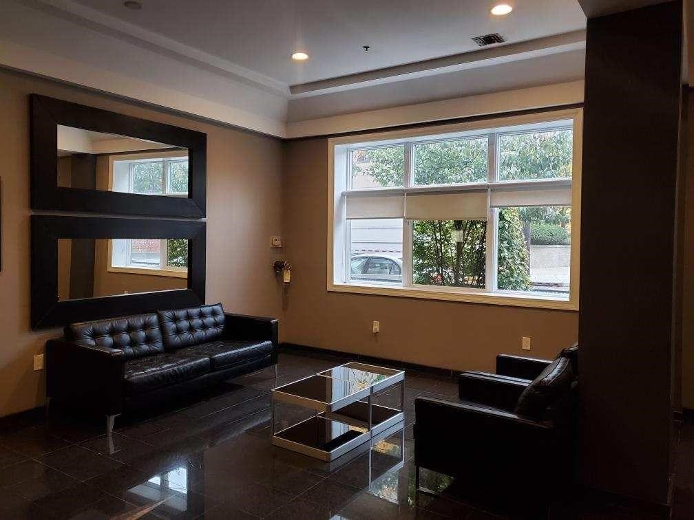 82 Clinton Street, Unit 5E Hoboken, NJ 07030 - Photo 2 of 7 a living room with furniture and a window