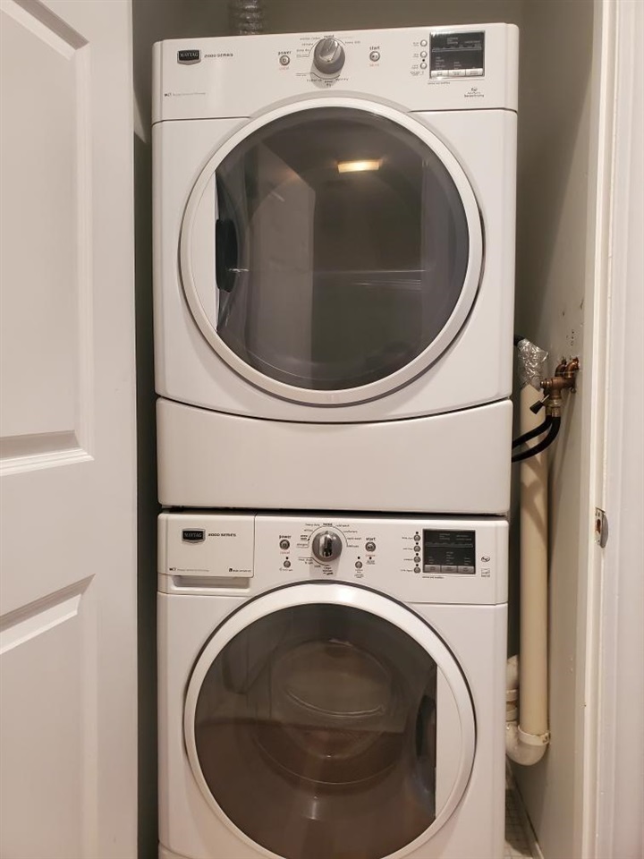 82 Clinton Street, Unit 5E Hoboken, NJ 07030 - Photo 7 of 7 a utility room with dryer and washer