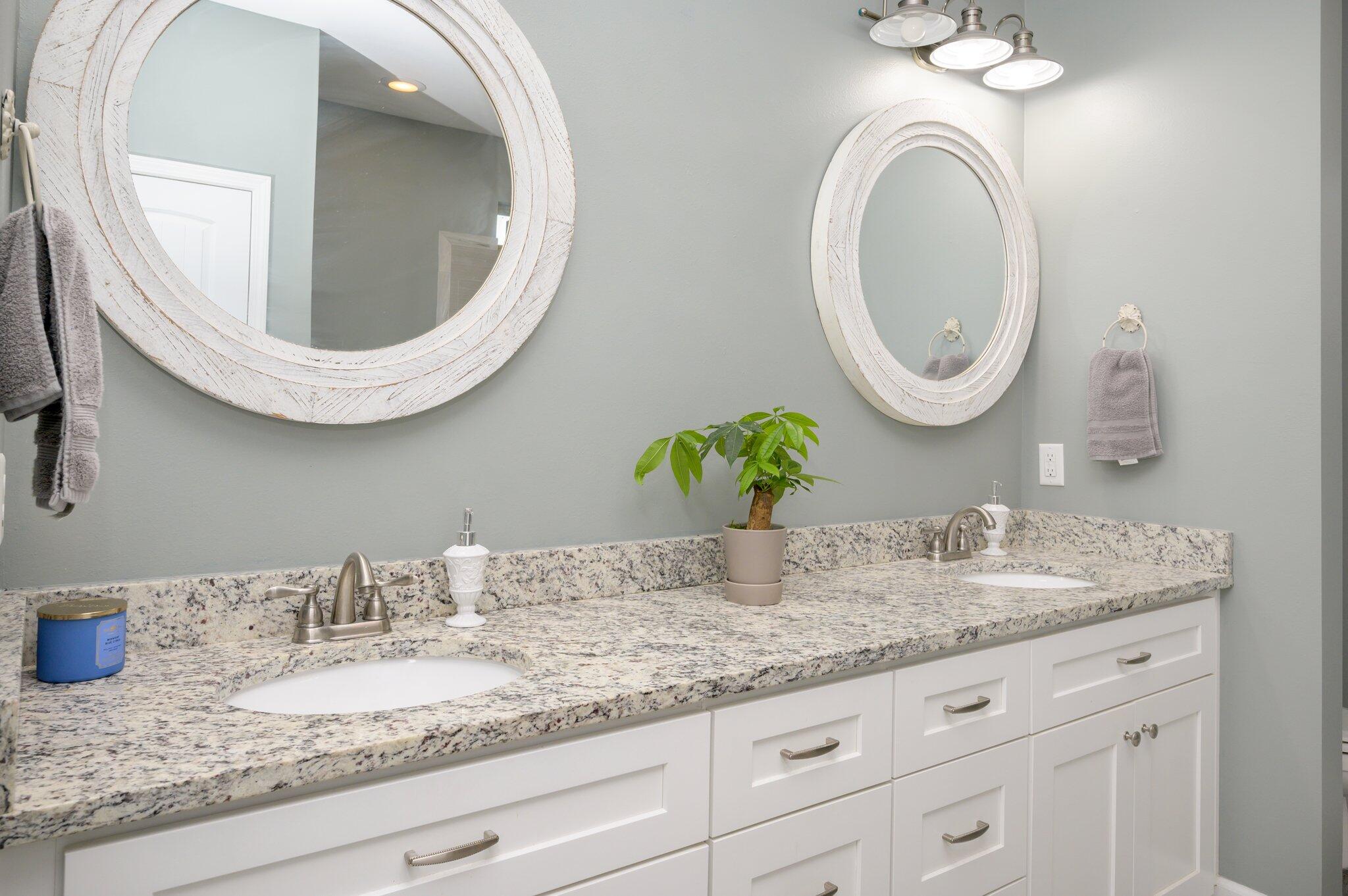 5620 Price Plantation Road Baker, FL 32531 - Photo 27 of 37 a bathroom with a granite countertop double vanity sink and a mirror
