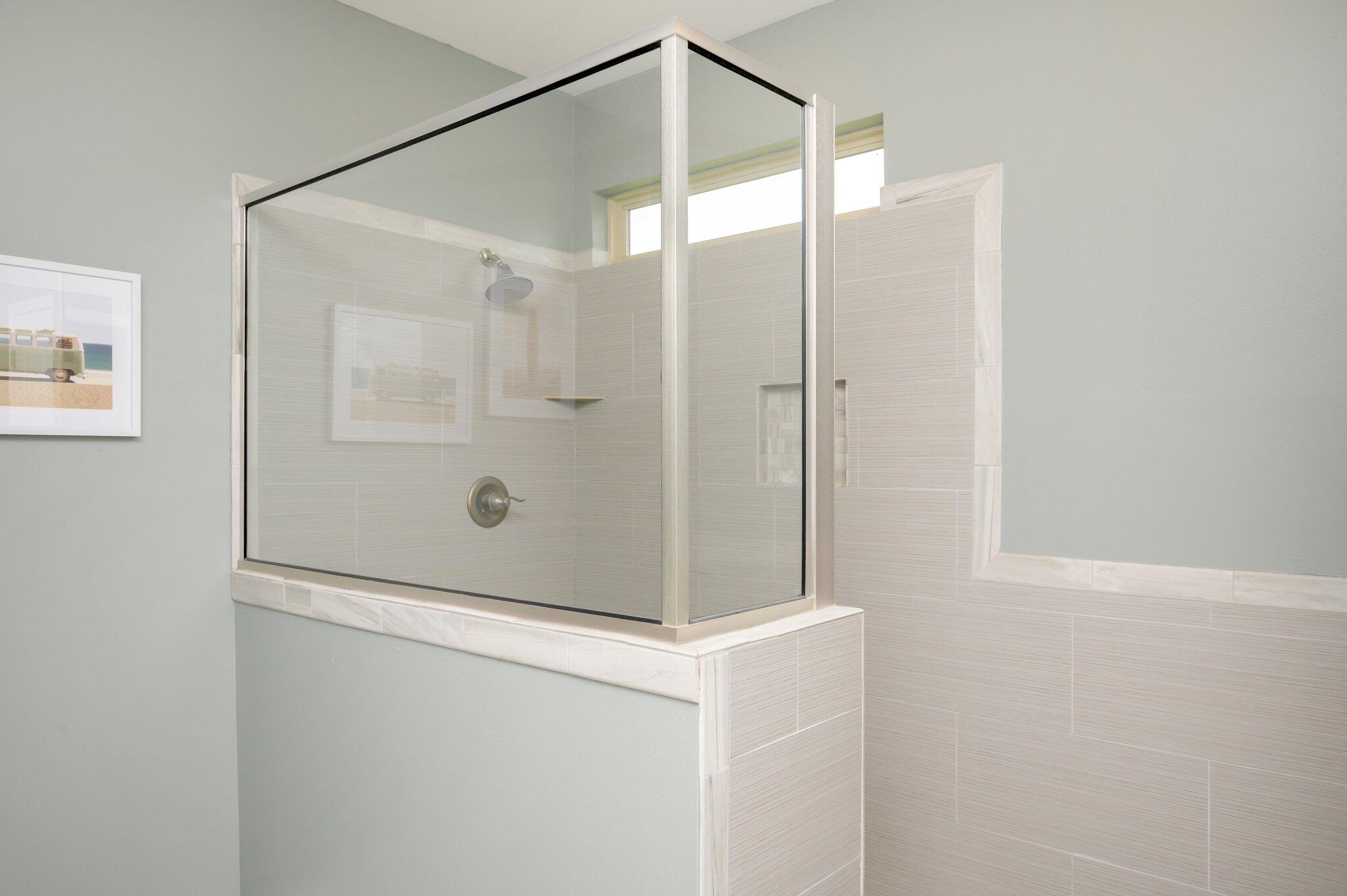 5620 Price Plantation Road Baker, FL 32531 - Photo 29 of 37 a bathroom with a glass shower door