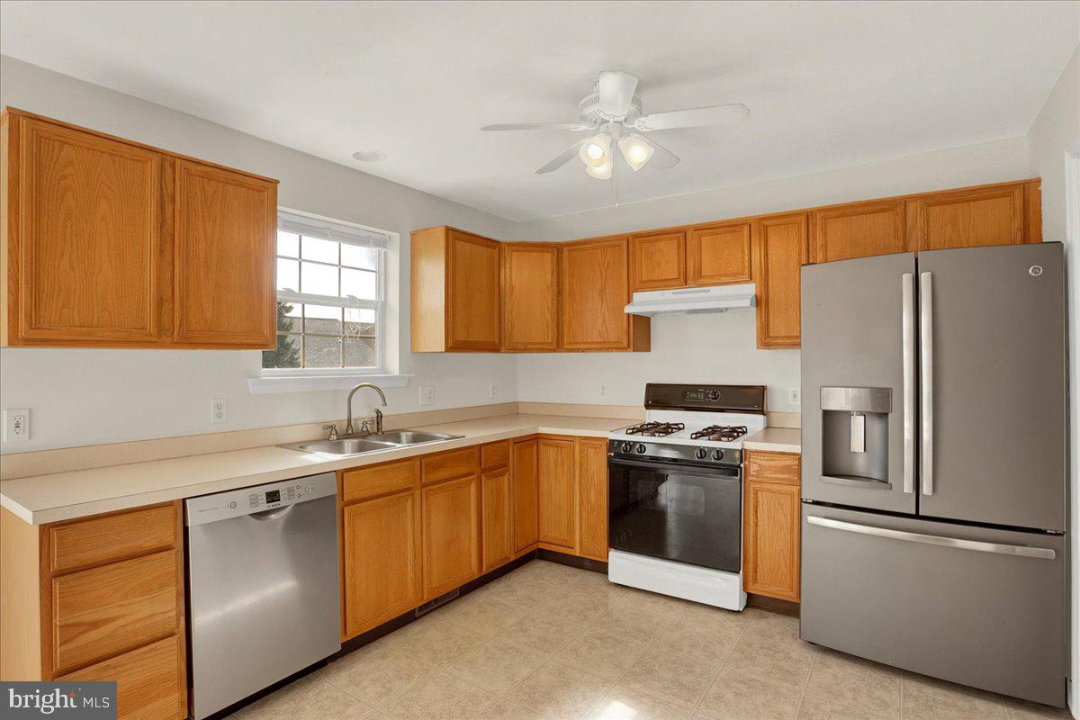 1180 Wanda Drive Hanover, PA 17331 - Photo 11 of 37 a kitchen with a sink appliances and cabinets