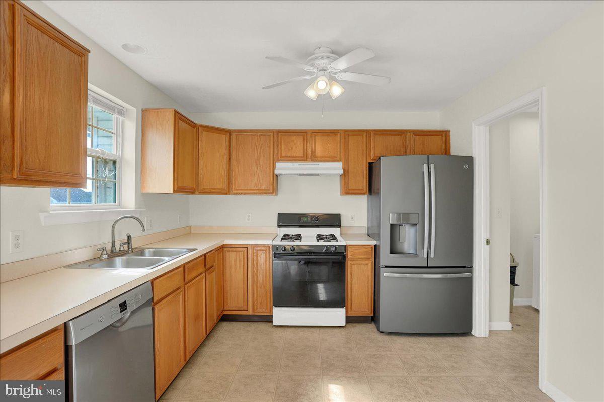 1180 Wanda Drive Hanover, PA 17331 - Photo 12 of 37 a kitchen with stainless steel appliances granite countertop a refrigerator sink and cabinets