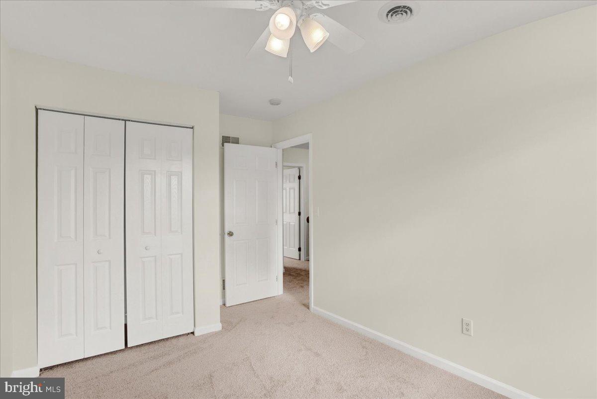1180 Wanda Drive Hanover, PA 17331 - Photo 25 of 37 an empty room with a chandelier fan