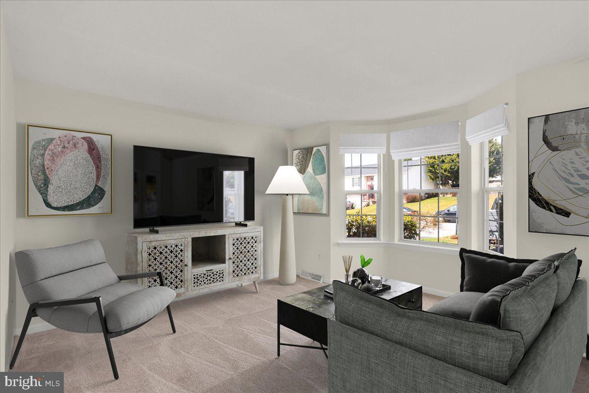 1180 Wanda Drive Hanover, PA 17331 - Photo 5 of 37 a living room with furniture and a flat screen tv