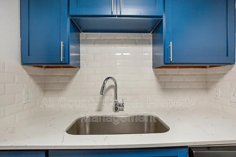 404 West 35th Street, Unit 101 Austin, TX 78705 - Photo 7 of 10 a close view of sink and tap