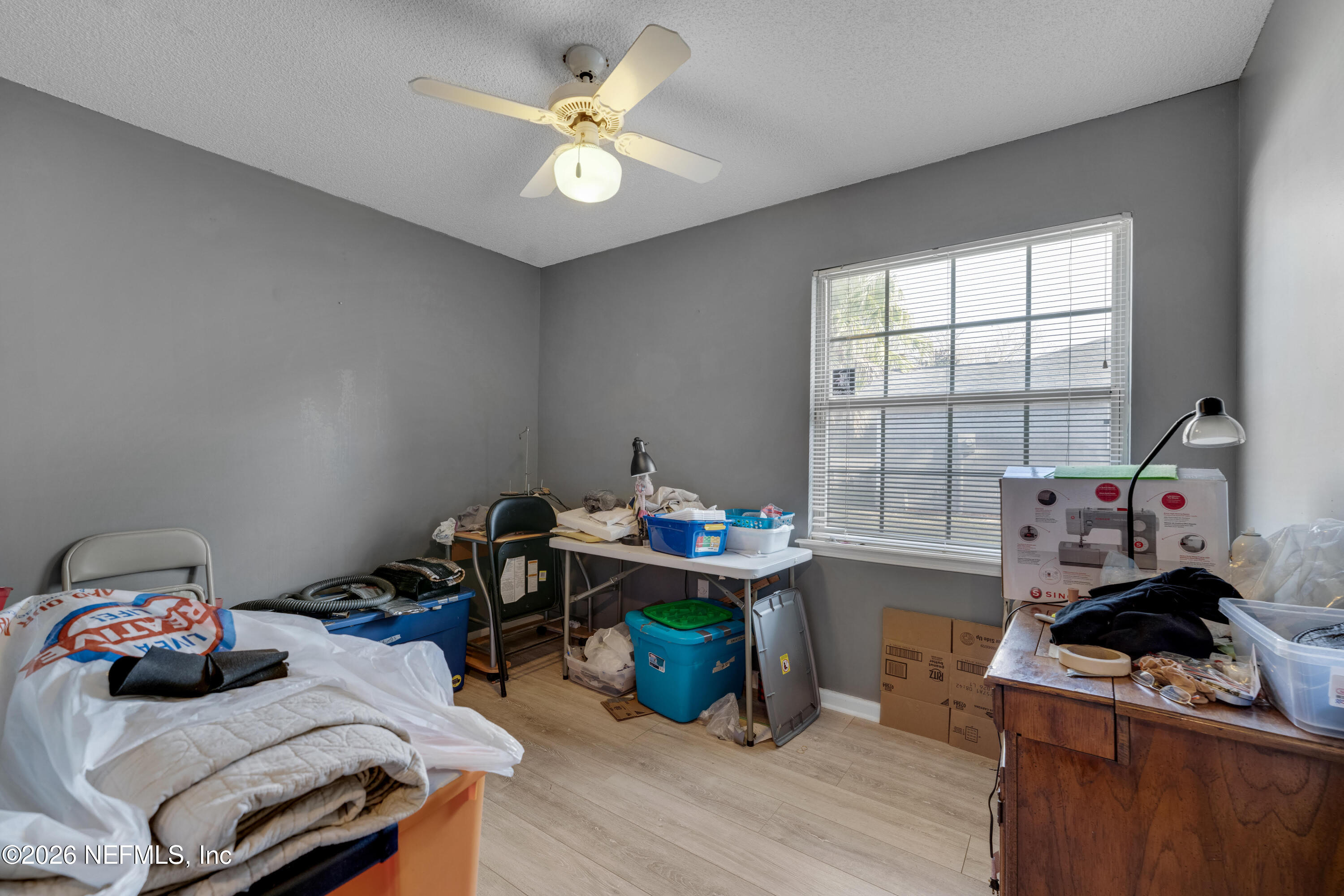 3566 Pond Ridge Court West Jacksonville, FL 32223 - Photo 12 of 17 a view of a workspace with furniture and a window