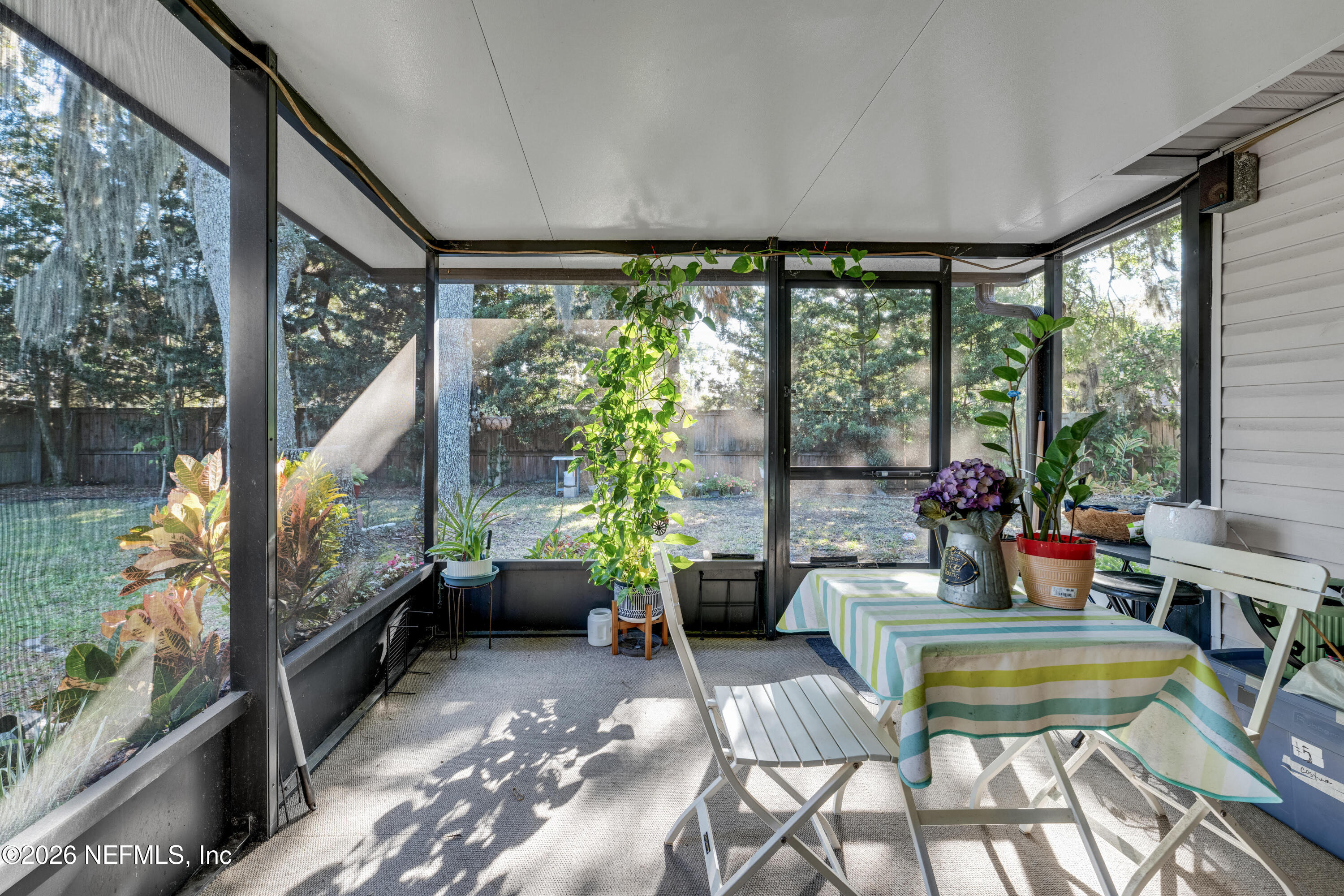 3566 Pond Ridge Court West Jacksonville, FL 32223 - Photo 13 of 17 a room with furniture and a large window