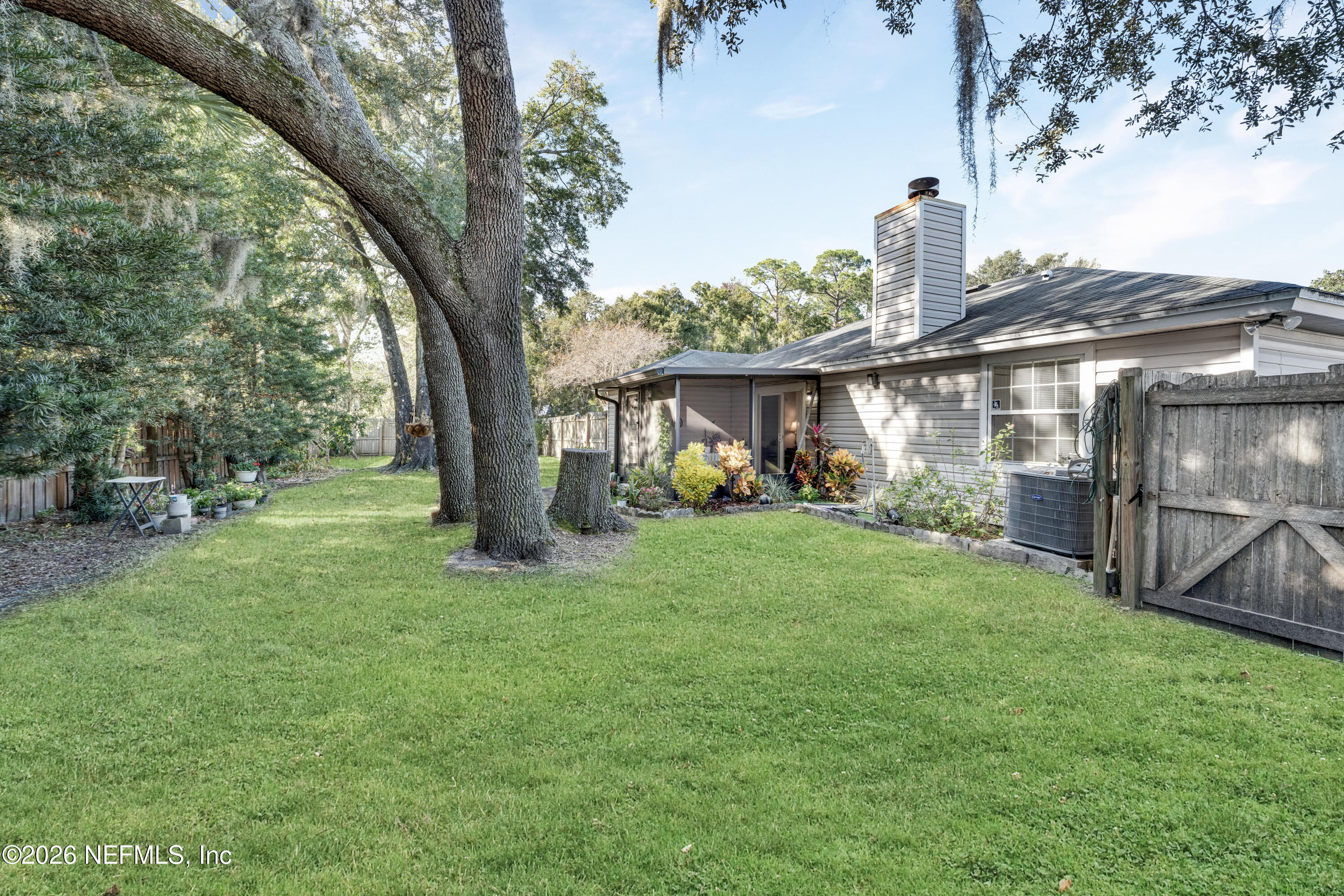 3566 Pond Ridge Court West Jacksonville, FL 32223 - Photo 15 of 17 a front view of a house with garden