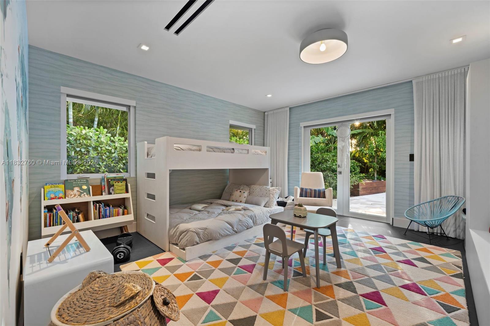 4800 Bay Point Road Miami, FL 33137 - Photo 12 of 74 a bedroom with a bed and a window