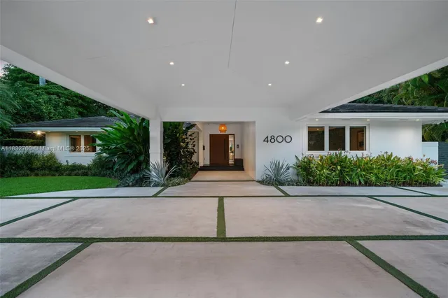 a view of a hallway with living room