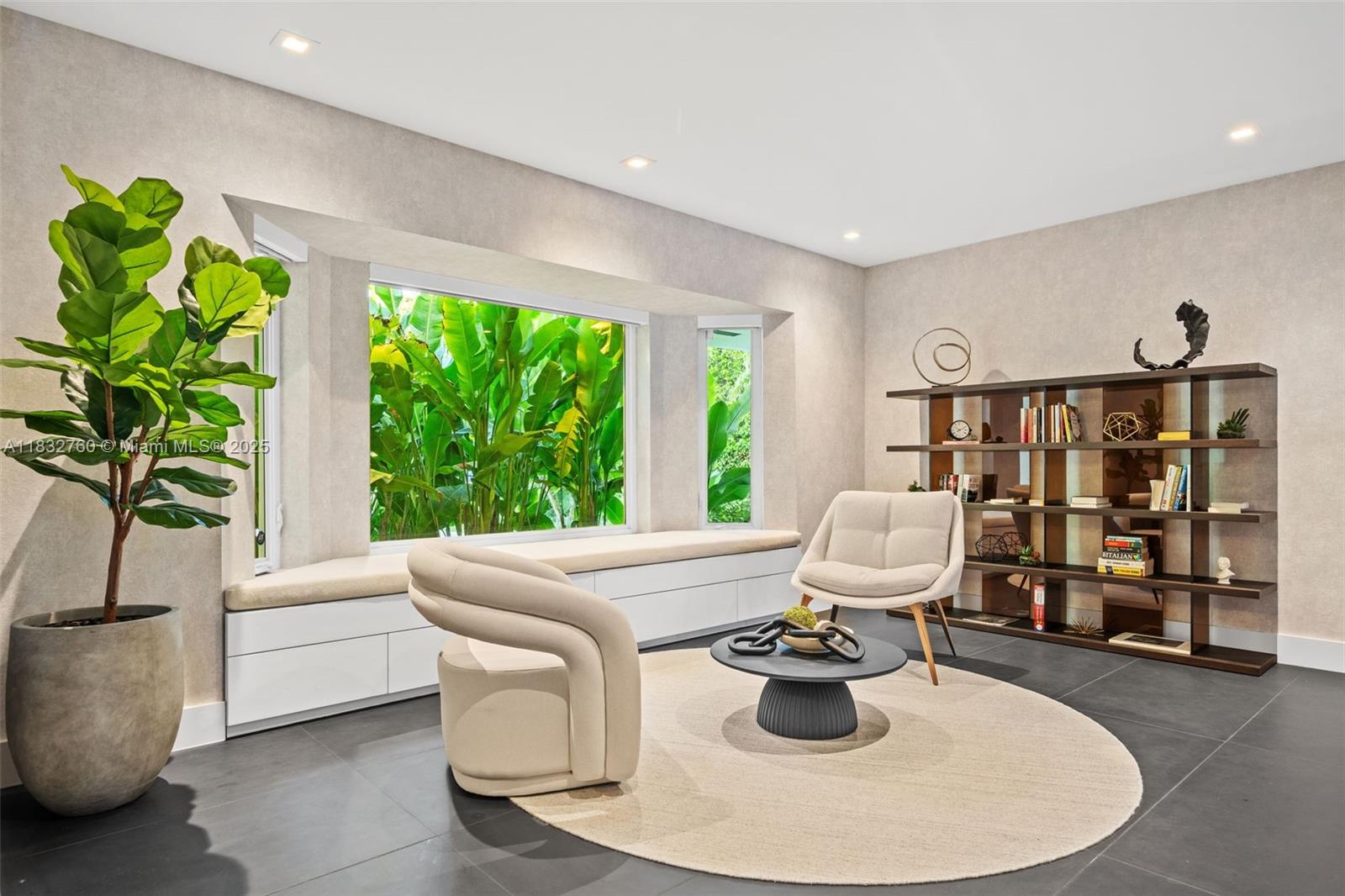 4800 Bay Point Road Miami, FL 33137 - Photo 22 of 74 a living room with furniture and a potted plant
