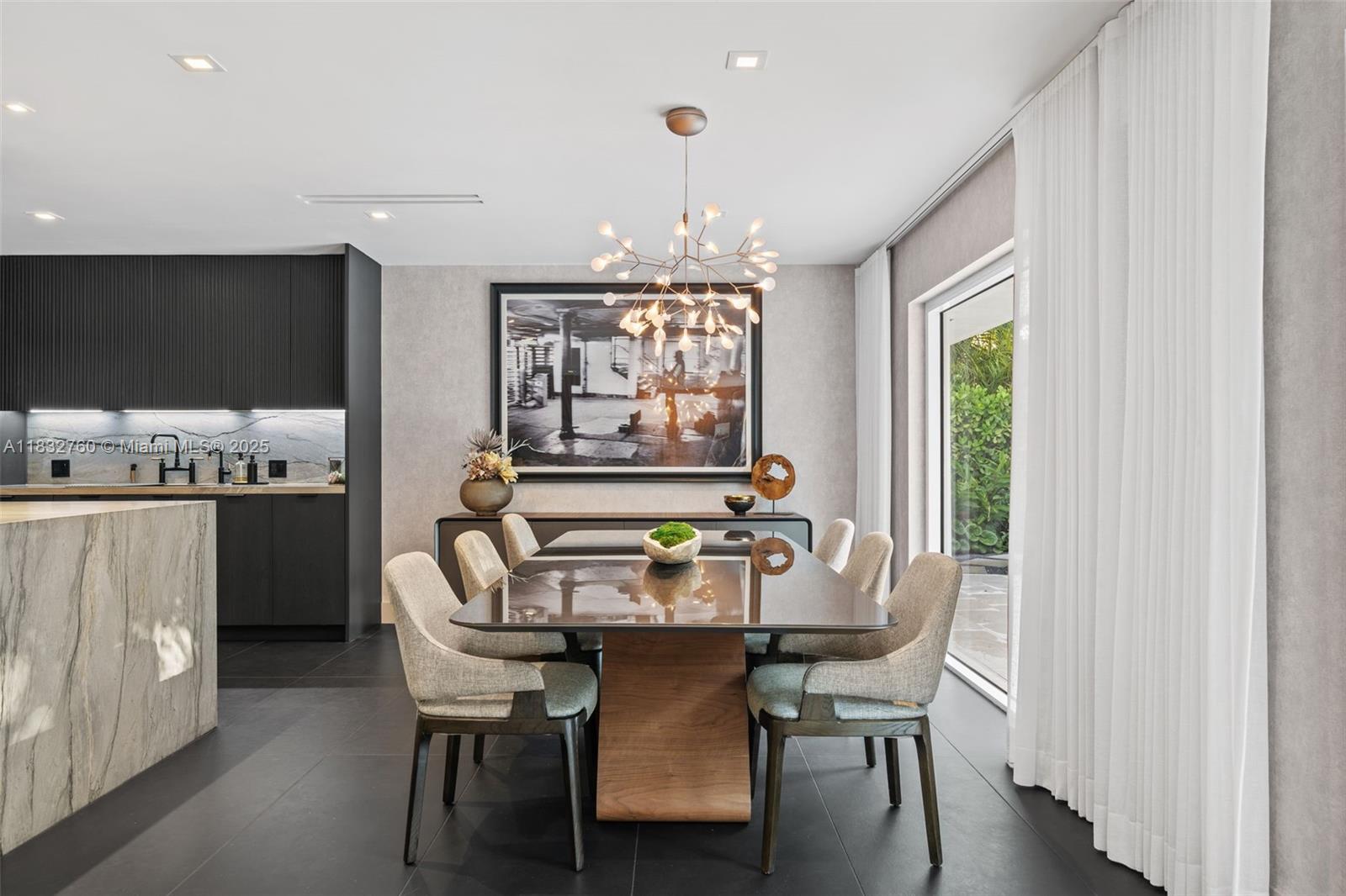 4800 Bay Point Road Miami, FL 33137 - Photo 27 of 74 a view of a dining room with furniture window and outside view