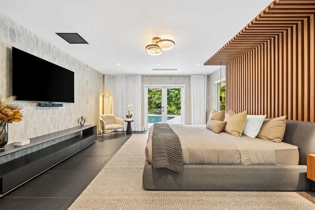 a bathroom with a bathtub and a sink